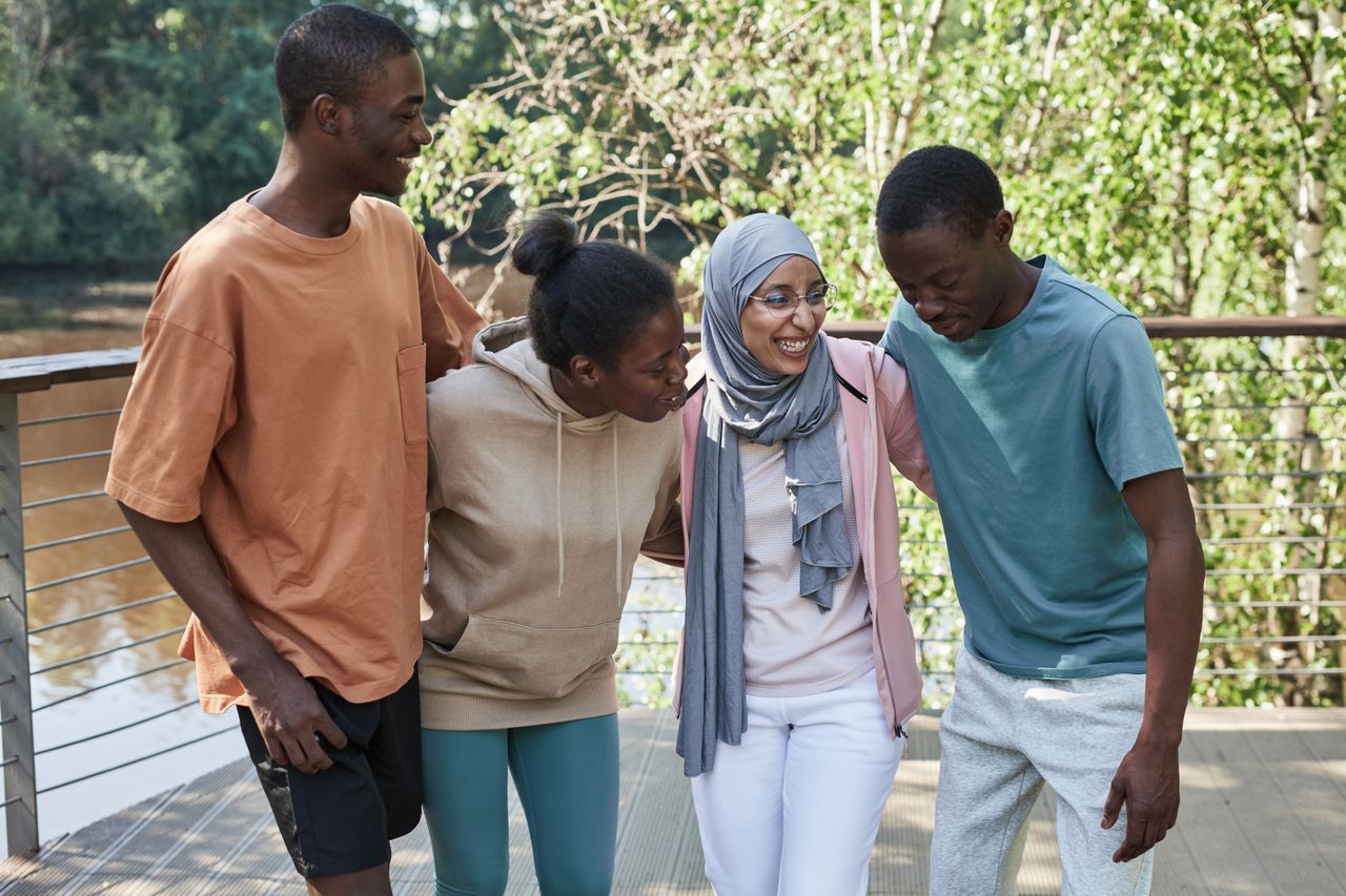 People connecting in a supportive, human moment